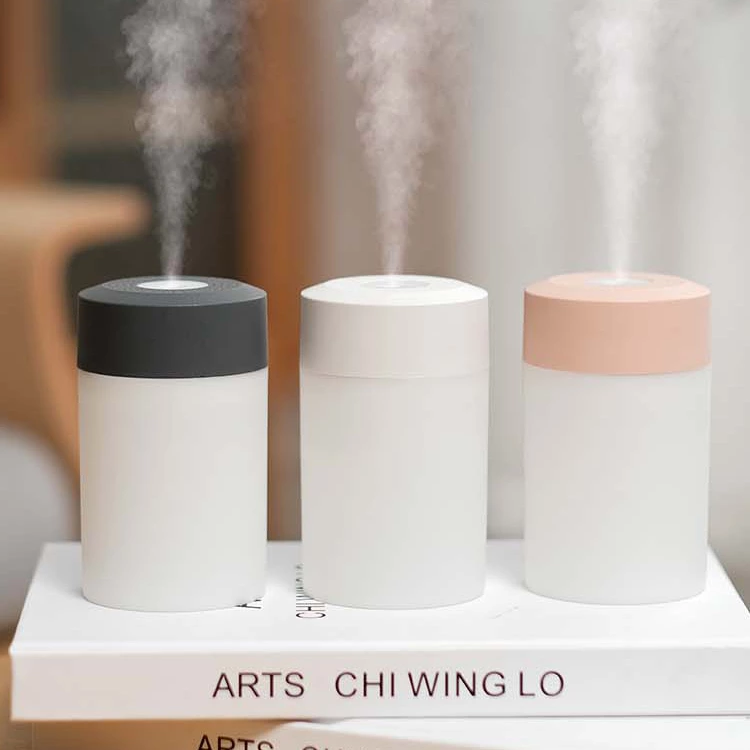 Dual-Mode Mini Humidifier: Quiet operation with warm rainbow lighting, ideal for home/office/travel use